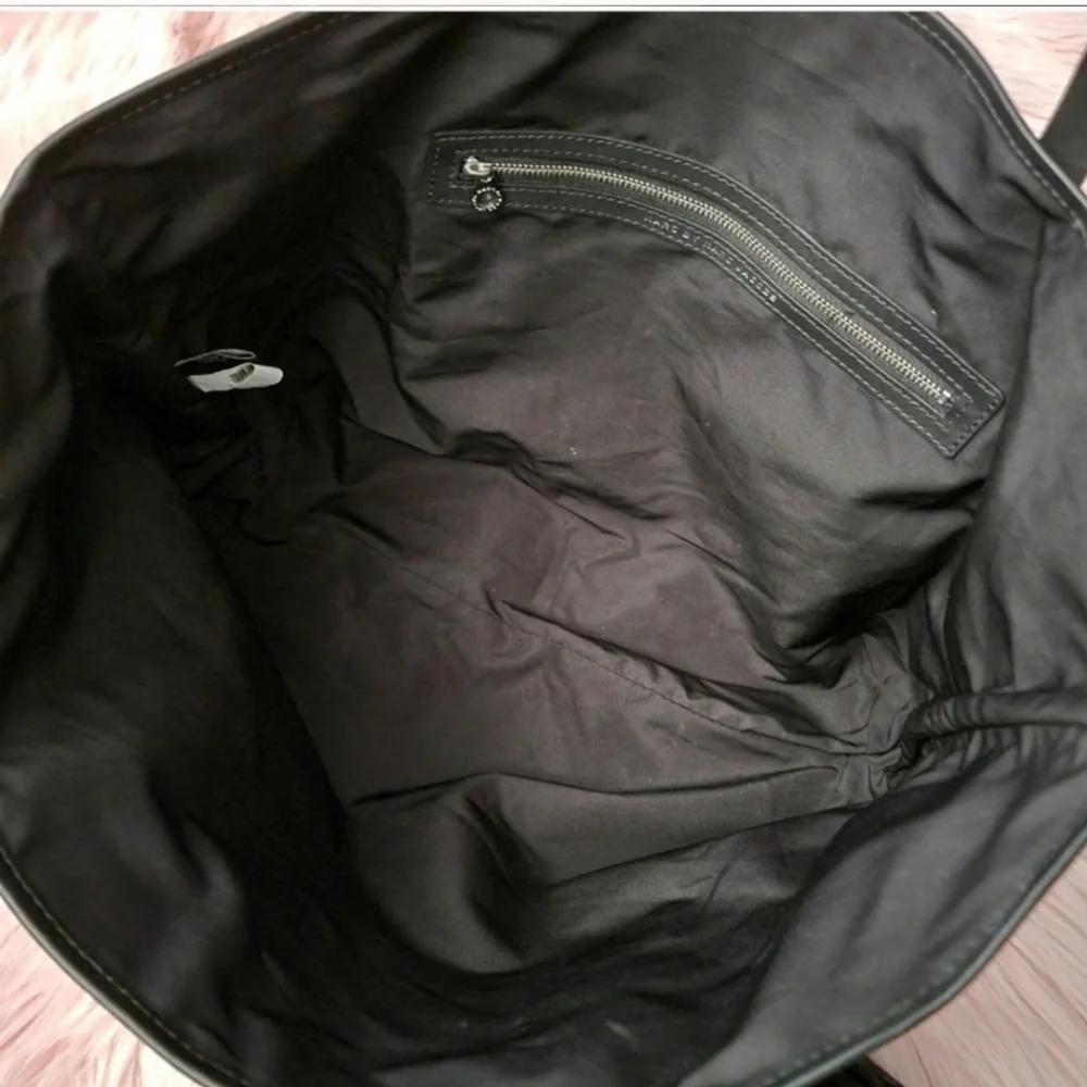 Marc by Marc Jacobs monogrammed PVC leather strap tote bag